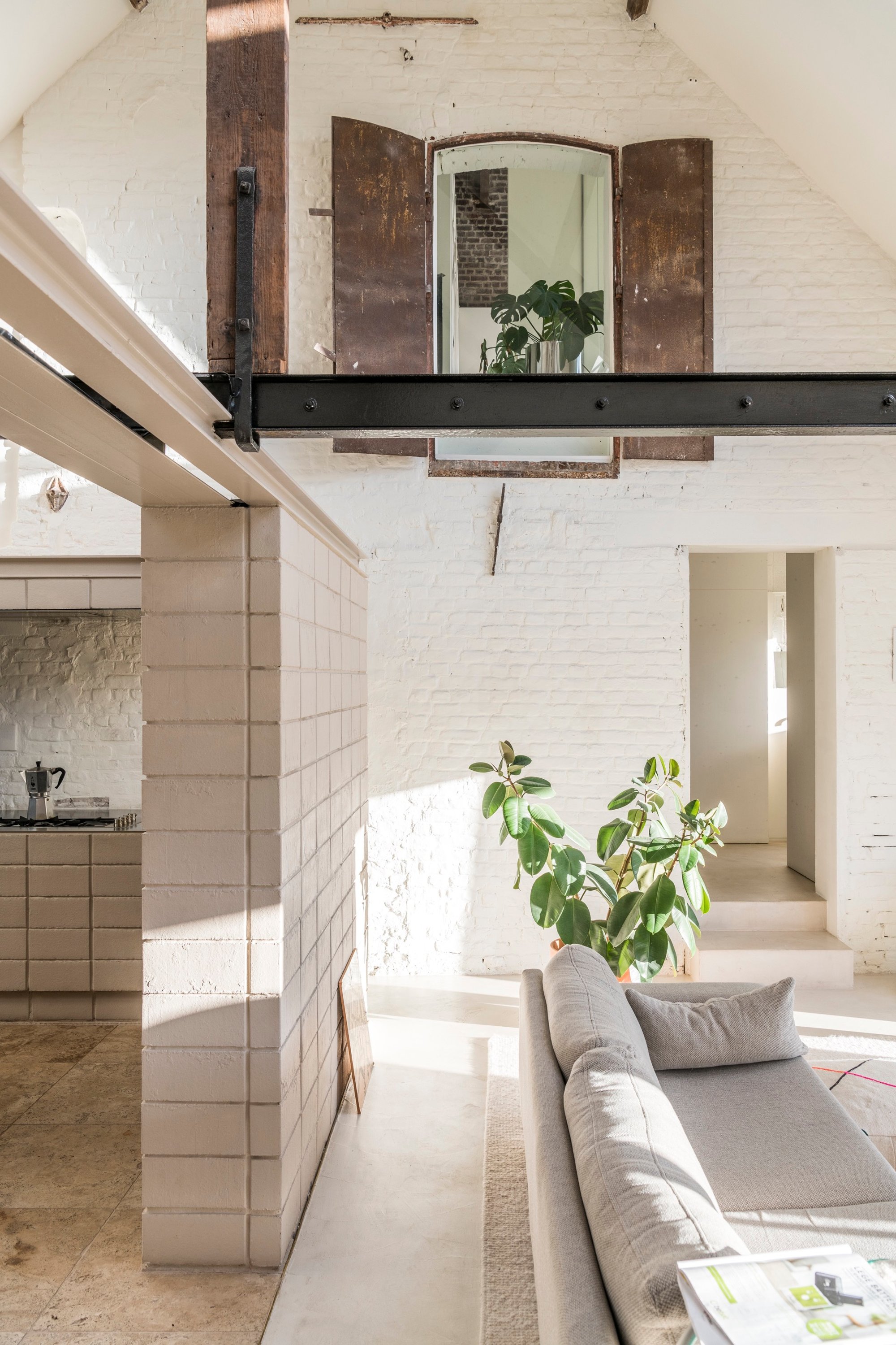 AUX Transforms a 19th Century Ghent Steam Brewery into a Home with a Rooftop Garden