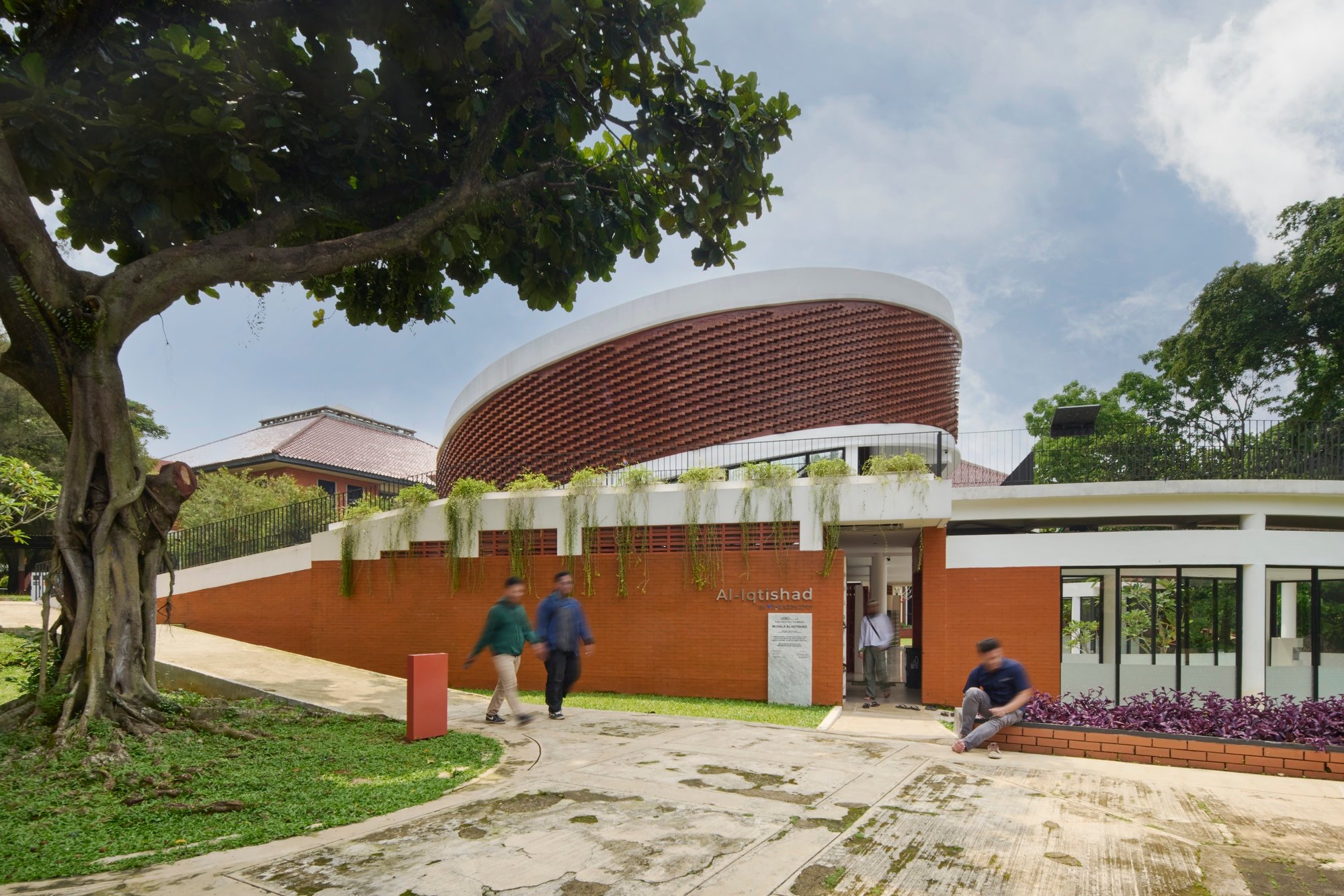 CREM Paragon x KIND Wraps a University Mosque in a Woven Brick Drum on the Edge of a Lake