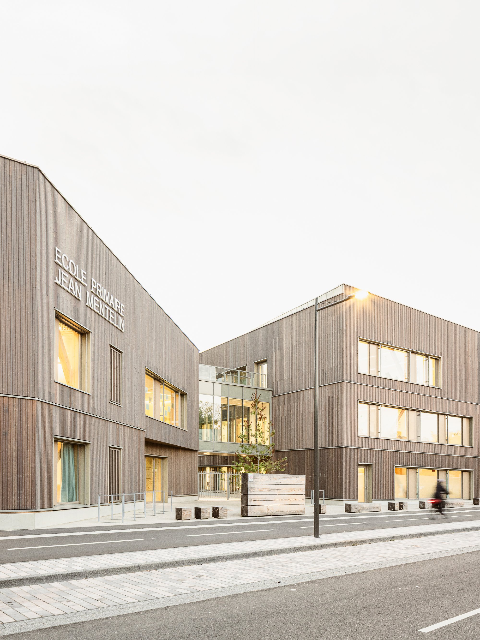 feld72 and Agence MW Fragment a Strasbourg School into Three Timber Volumes Rooted in Nature