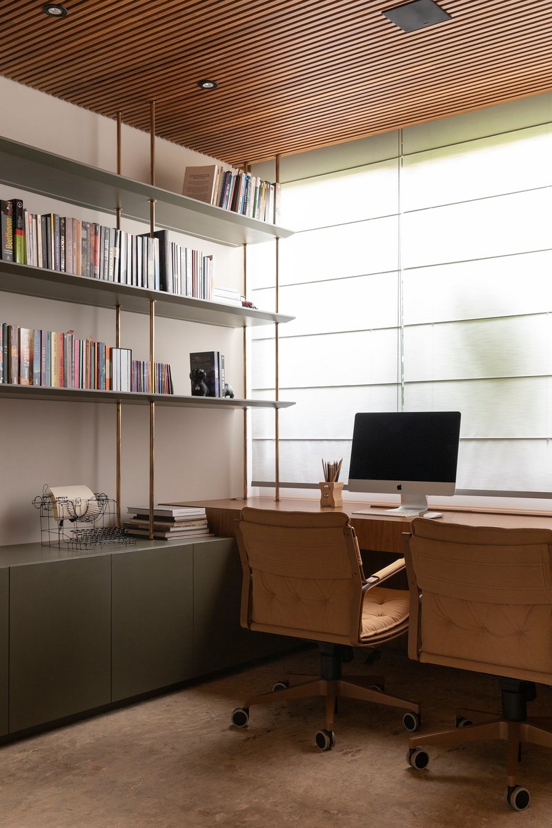 Home office with timber slat ceiling and translucent horizontal panel window wall