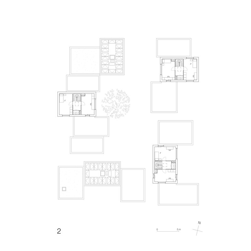 Second floor plan drawing showing upper levels and roof terraces with parking arrangements for the housing cluster
