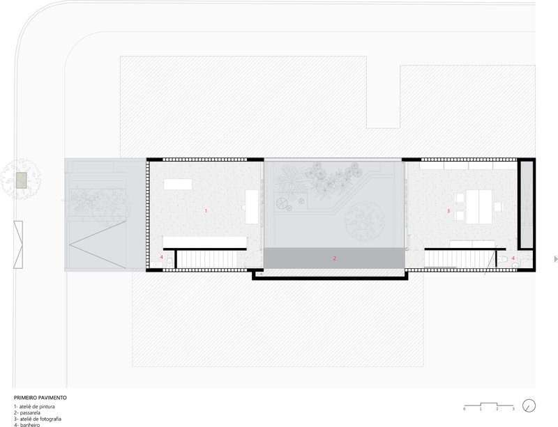 First floor plan showing interior rooms flanking a central courtyard with trees