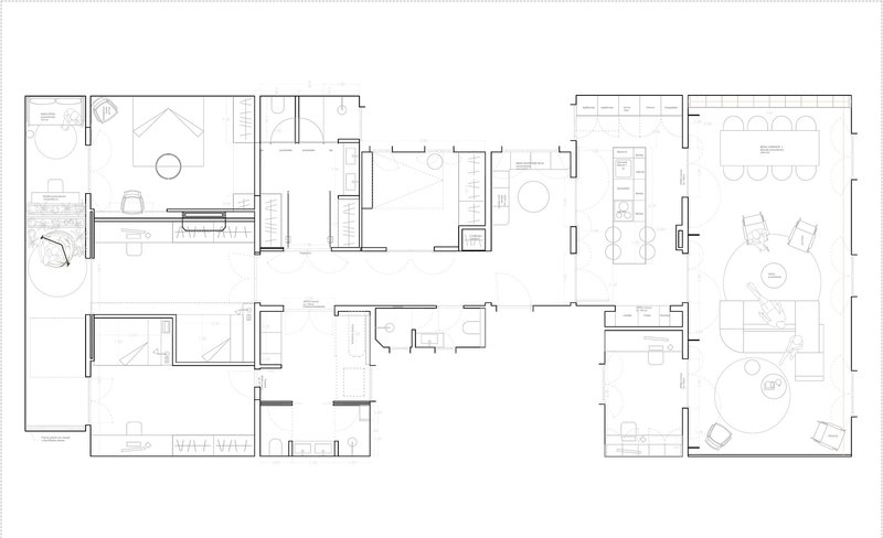 Floor plan drawing showing residential layout with living areas, bedrooms, bathrooms and kitchen