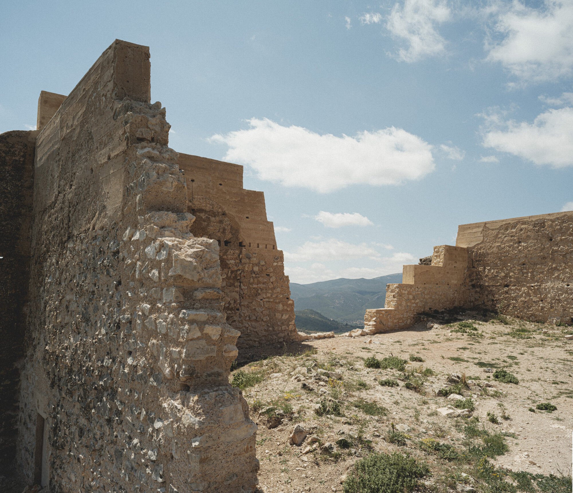 Belén Ilarri Studio Restores a Medieval Castle on a Valencian Hilltop with Rammed Earth and Restraint