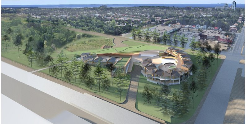 An aerial view of Children’s City reveals a nature-integrated school campus designed around courtyards, green roofs, and community spaces.