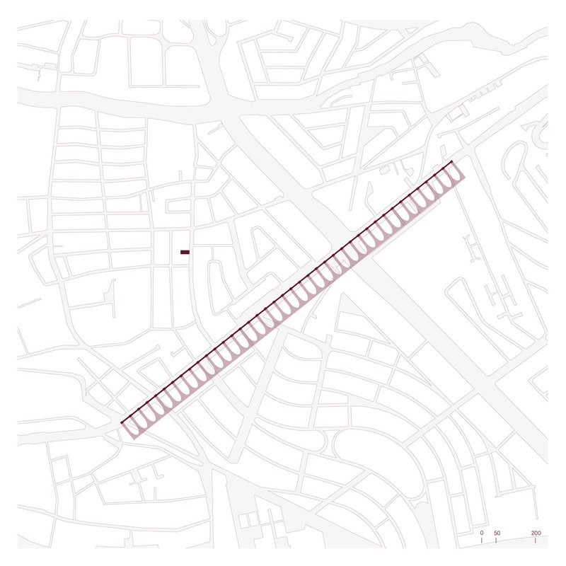 Site plan drawing showing the diagonal linear form intersecting the urban street grid with landscaped courtyards