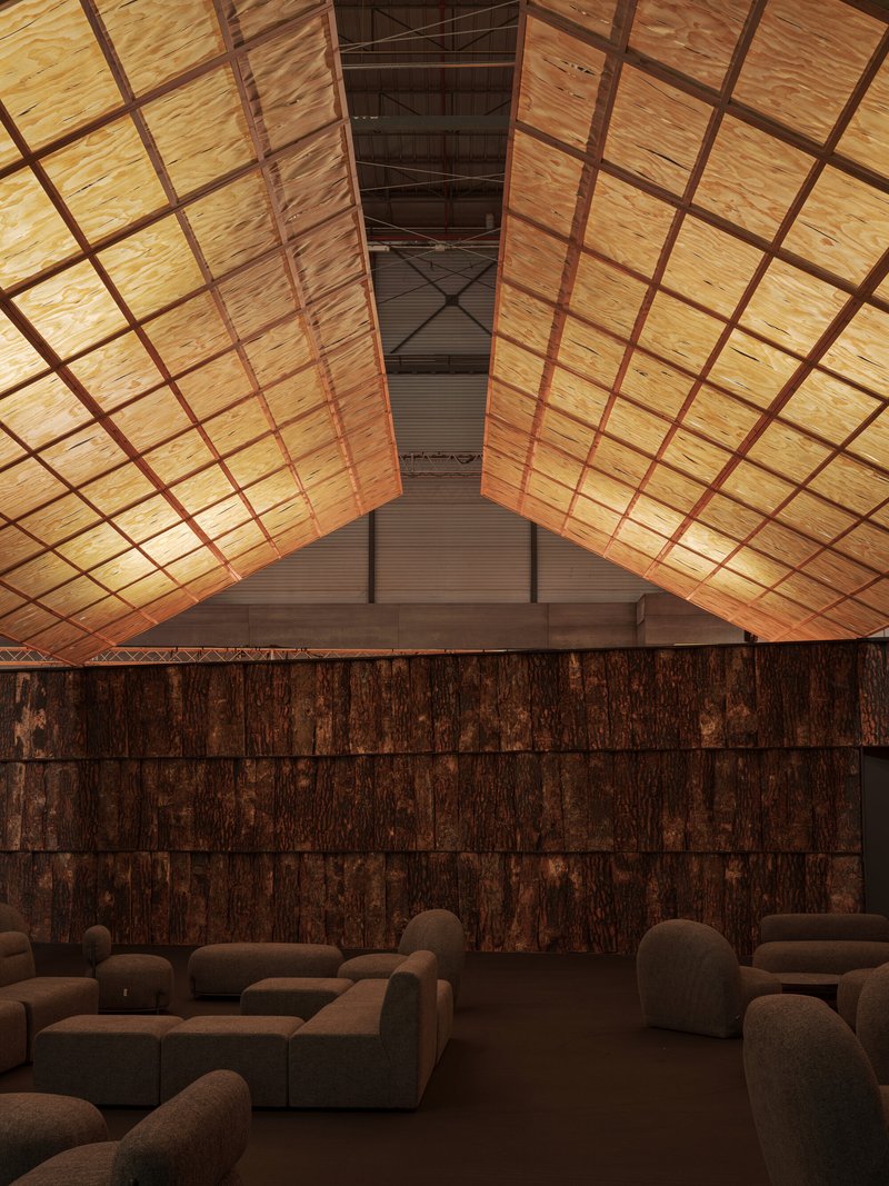 Vaulted gridded ceiling with timber framing over a lounge area with upholstered seating
