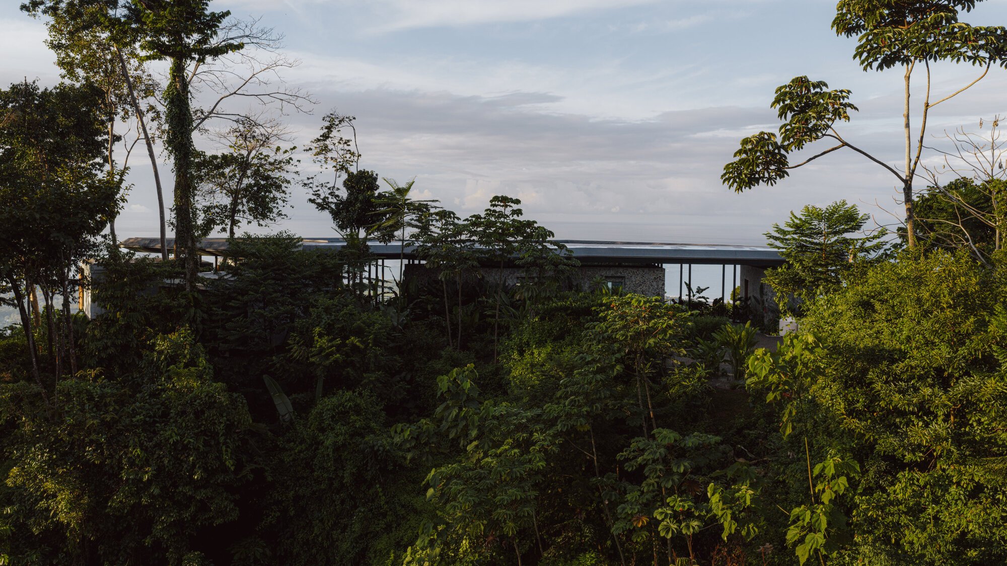Studio Saxe Scatters Steel Pavilions Across a Costa Rican Mountaintop Beneath One Floating Roof