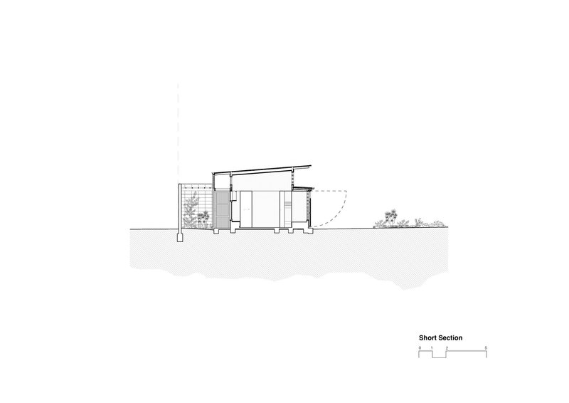 Short section drawing showing the entrance courtyard volume and sloping roof profile with adjacent plantings