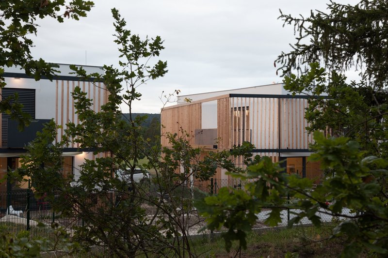 Axonometric diagram illustrating the “cube within a cube” concept and its layered privacy strategy.