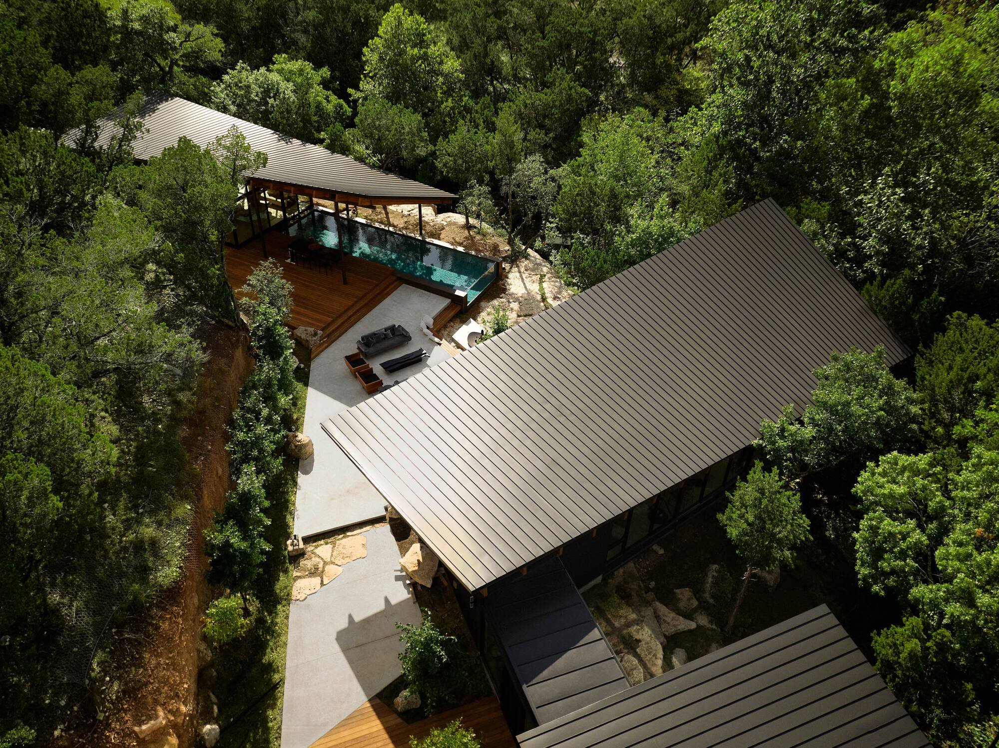 Bercy Fadel Sculpts Three Glass Pavilions from the Motion of Falling Oak Leaves in Austin
