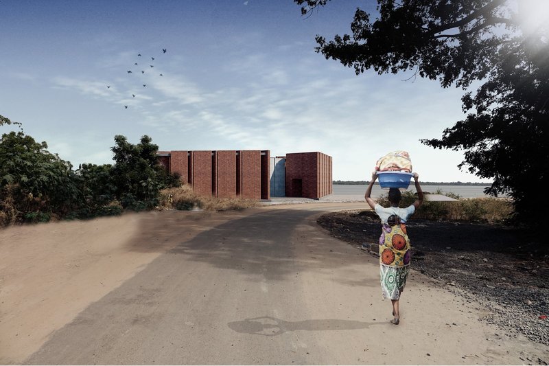 Approach view along a rural path, situating the pavilion within its local Senegalese context.