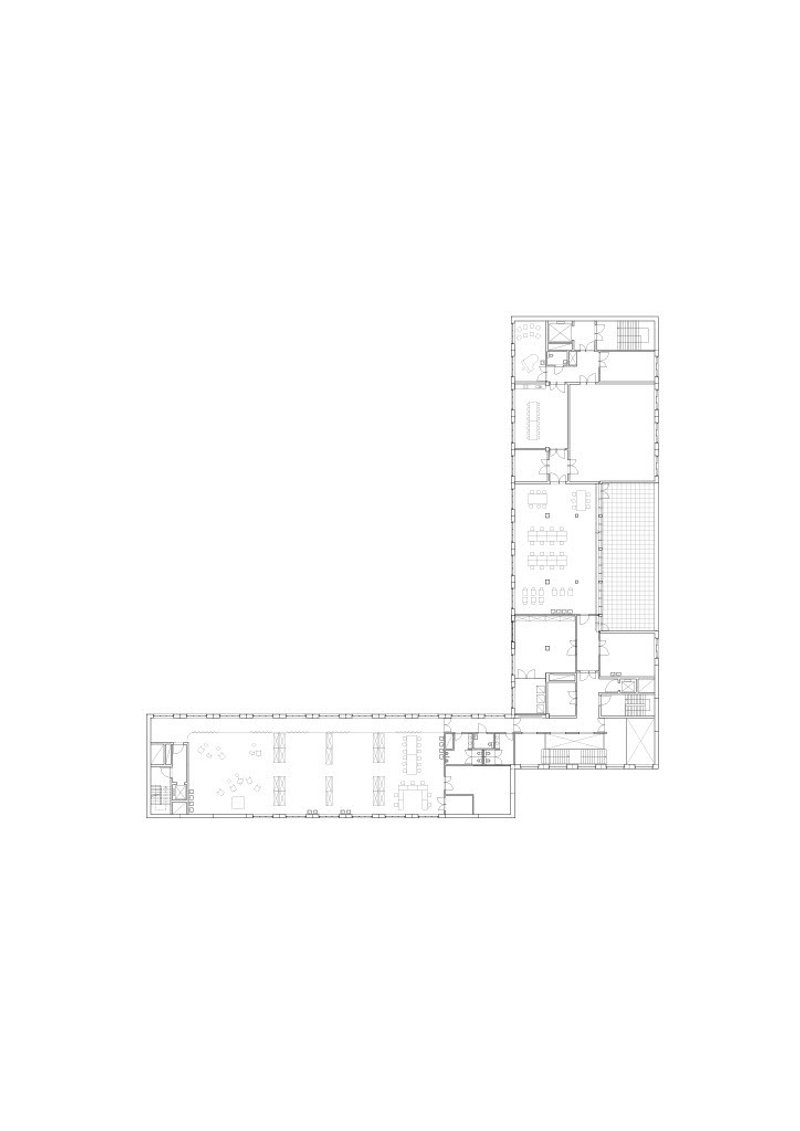Floor plan drawing of an L-shaped wing with rooms and corridors