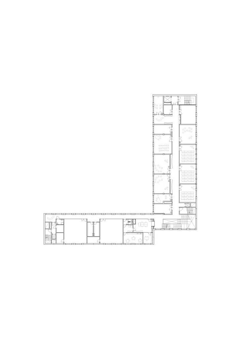 Floor plan drawing of an L-shaped wing showing interior partitions and circulation routes