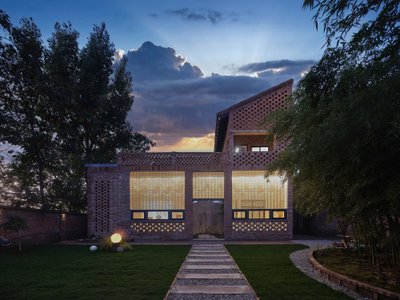 XAUAT Wraps a Rural Chinese Dwelling in Glass Bricks and Passive Climate Strategy