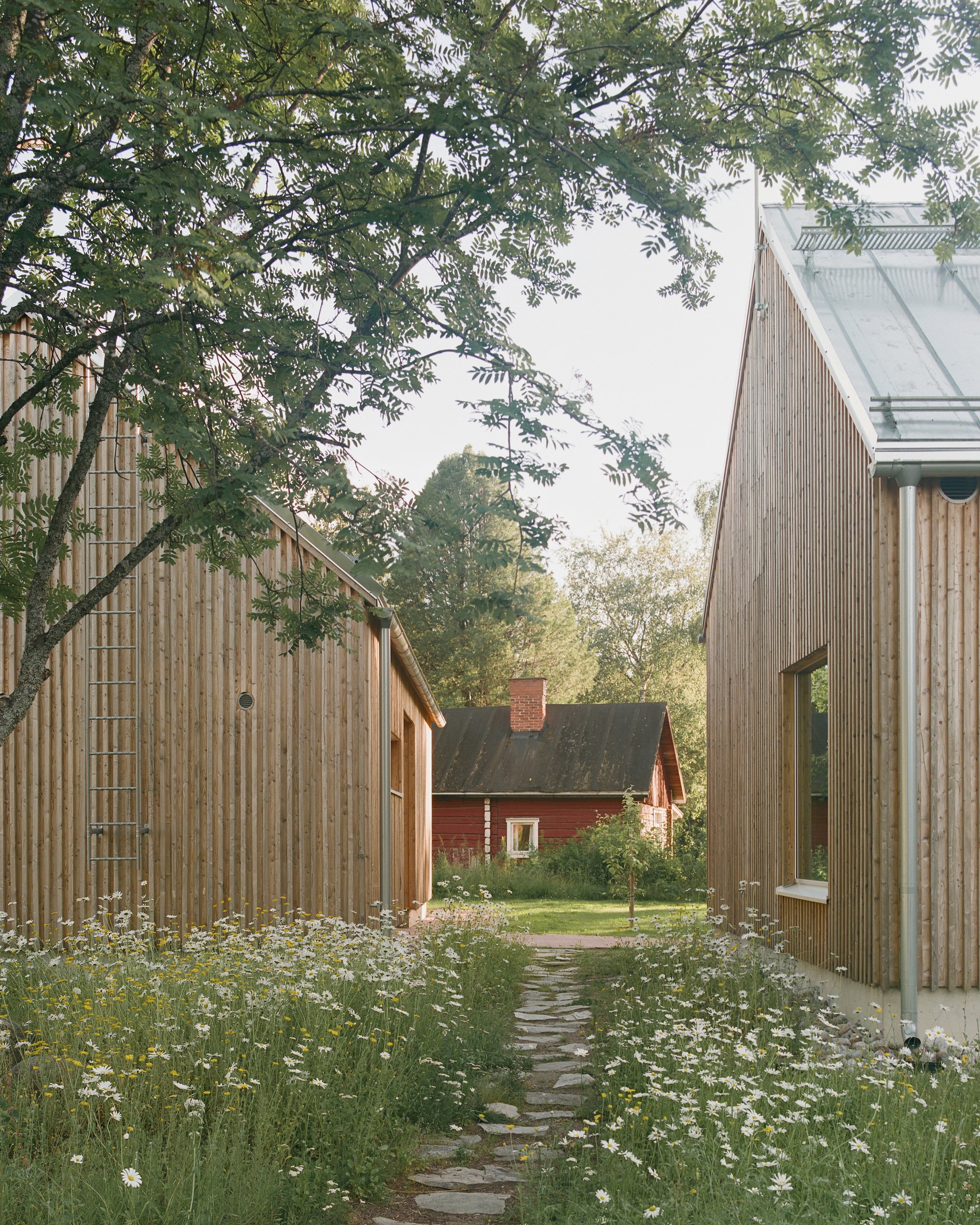 LUO Architects Build a Wind-Sheltered Sea Gate for Their Own Family on Finland's Coast