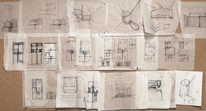 Collection of hand-drawn sketches showing floor plans, sections, and perspective studies on tracing paper