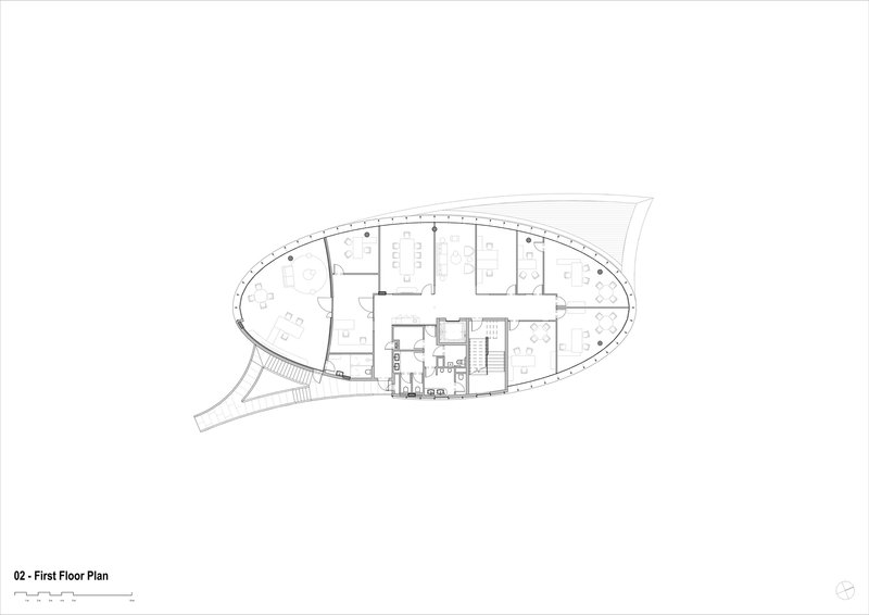 First floor plan drawing illustrating open office layout within curved perimeter and central core grouping