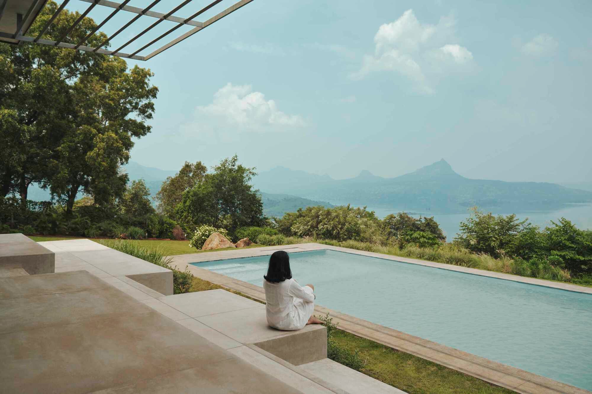 Mazumdar Bravo Tucks a Planted Concrete Pavilion into the Hillside Above Pawna Lake