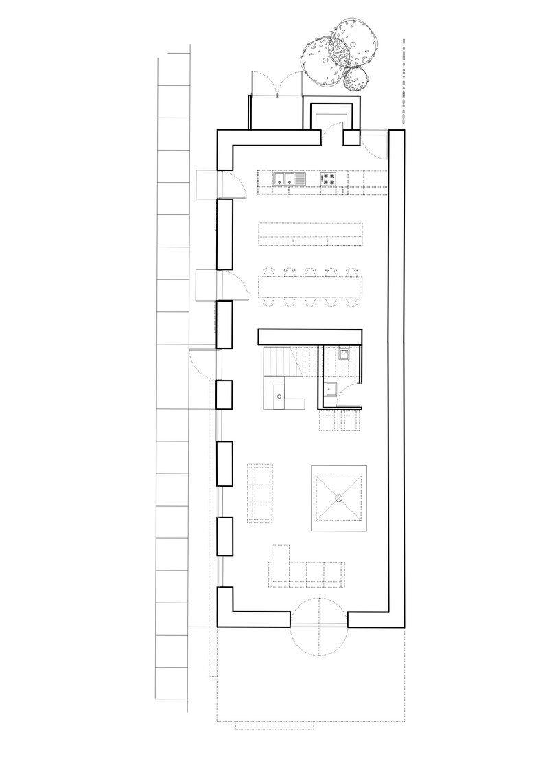 Ground floor plan drawing showing kitchen, dining area, and stair with adjacent tree