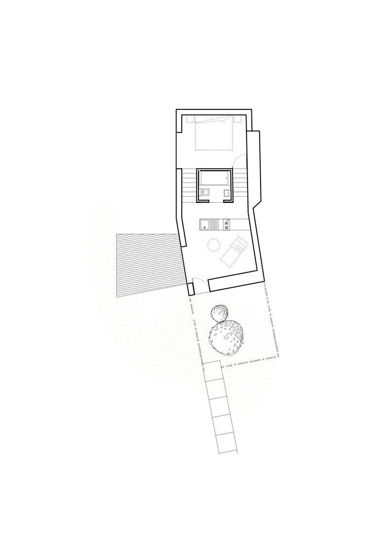 Roof plan drawing showing the angled upper volume with outdoor terrace and adjacent trees