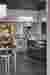 This architectural photo showcases a modern self-serve station in a retail or cafe setting. The desi