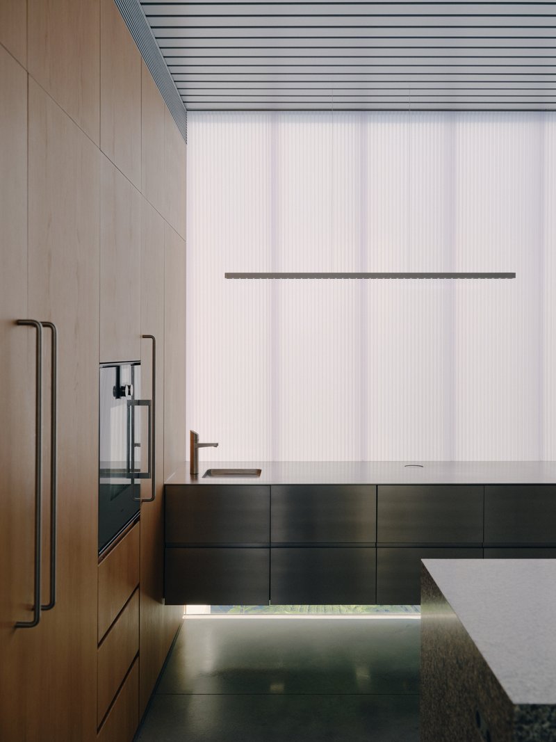 Kitchen with timber cabinetry, black base units, and translucent corrugated wall panels in soft daylight