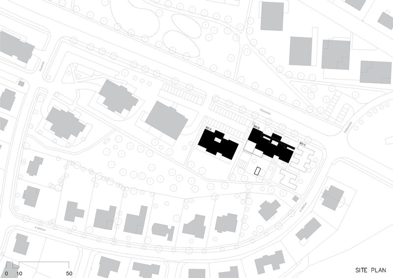 Site plan drawing showing two residential blocks positioned within a curved suburban street layout