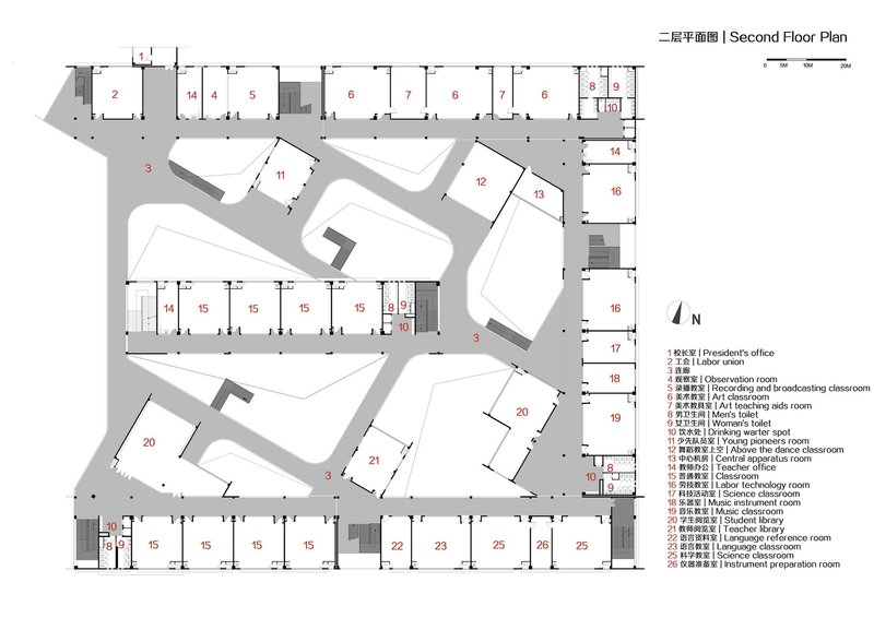 Second floor plan illustrating double-height voids connecting to classrooms and administrative spaces below