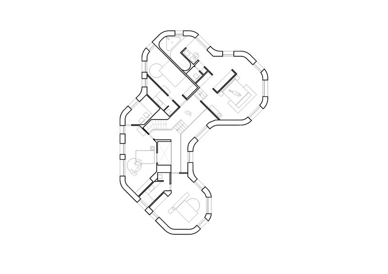 Floor plan drawing of an upper level with three lobed volumes and circulation spaces