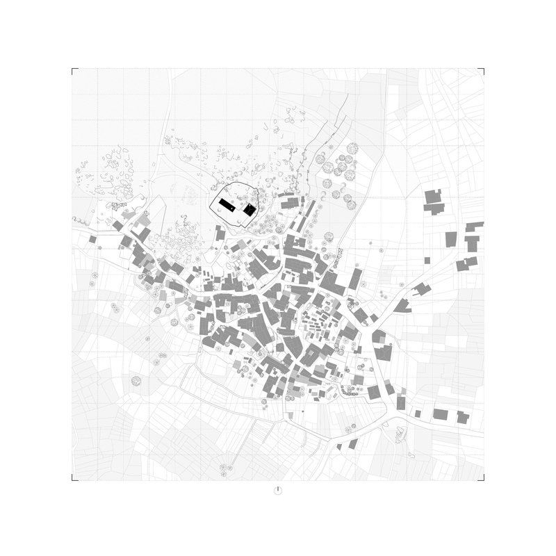 Site plan drawing showing scattered building footprints within a network of roads and trees