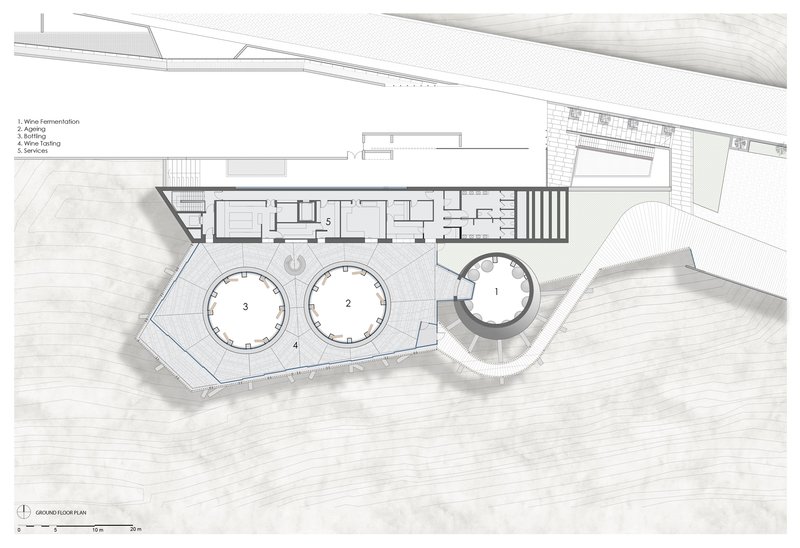 Ground floor plan drawing showing three circular volumes connected to linear service wing and entrance plaza