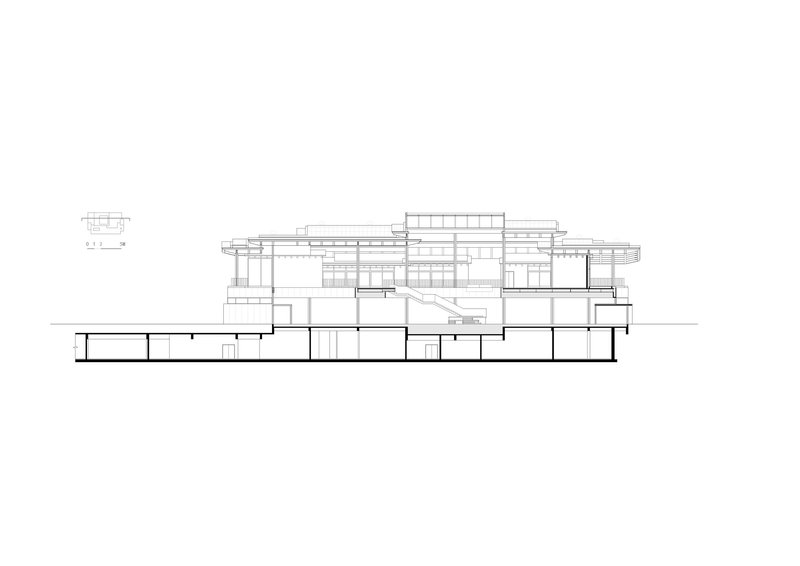 Section drawing showing the layered roof planes cantilevering over open terraces and ground-level spaces