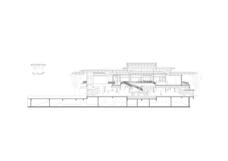 Section drawing featuring a diagonal staircase connecting multiple levels beneath the overhanging roof assembly