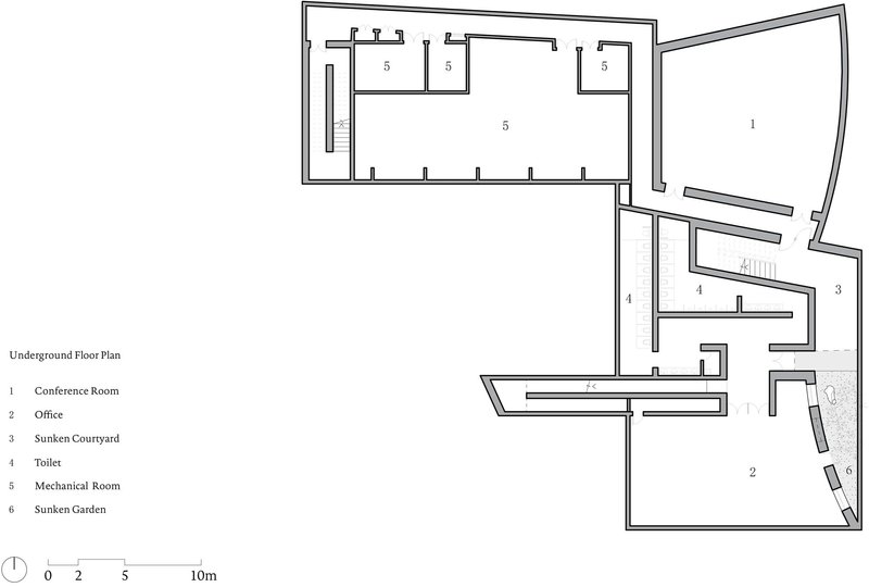 Underground floor plan drawing revealing sunken courtyards, conference room, and mechanical spaces below grade