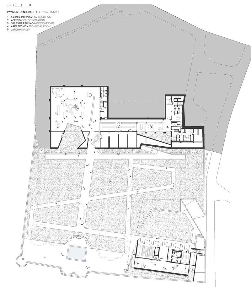 Lower floor plan drawing showing gallery spaces and meeting rooms arranged around landscaped courtyards