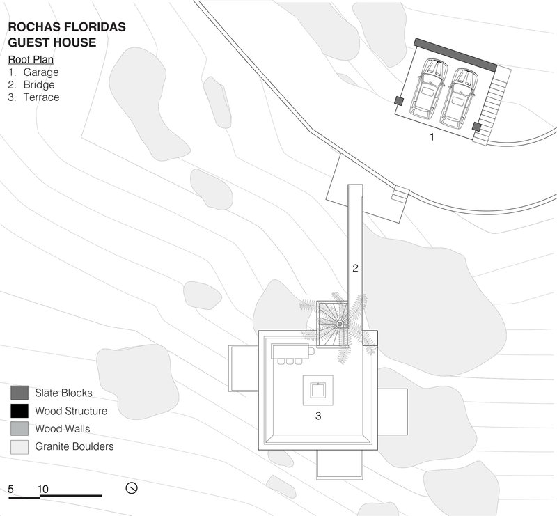 Roof plan showing garage with two cars, bridge connection, and terrace on sloped site with boulders