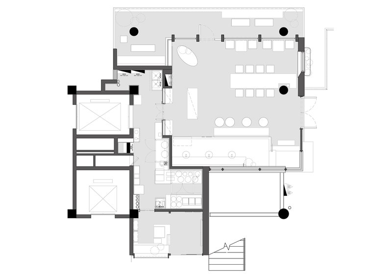Floor plan drawing showing dining hall, kitchen, two bedrooms and courtyard in rectangular layout