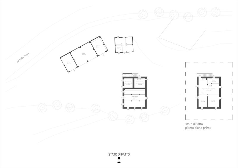 Site layout drawing showing four separate building footprints scattered across the property