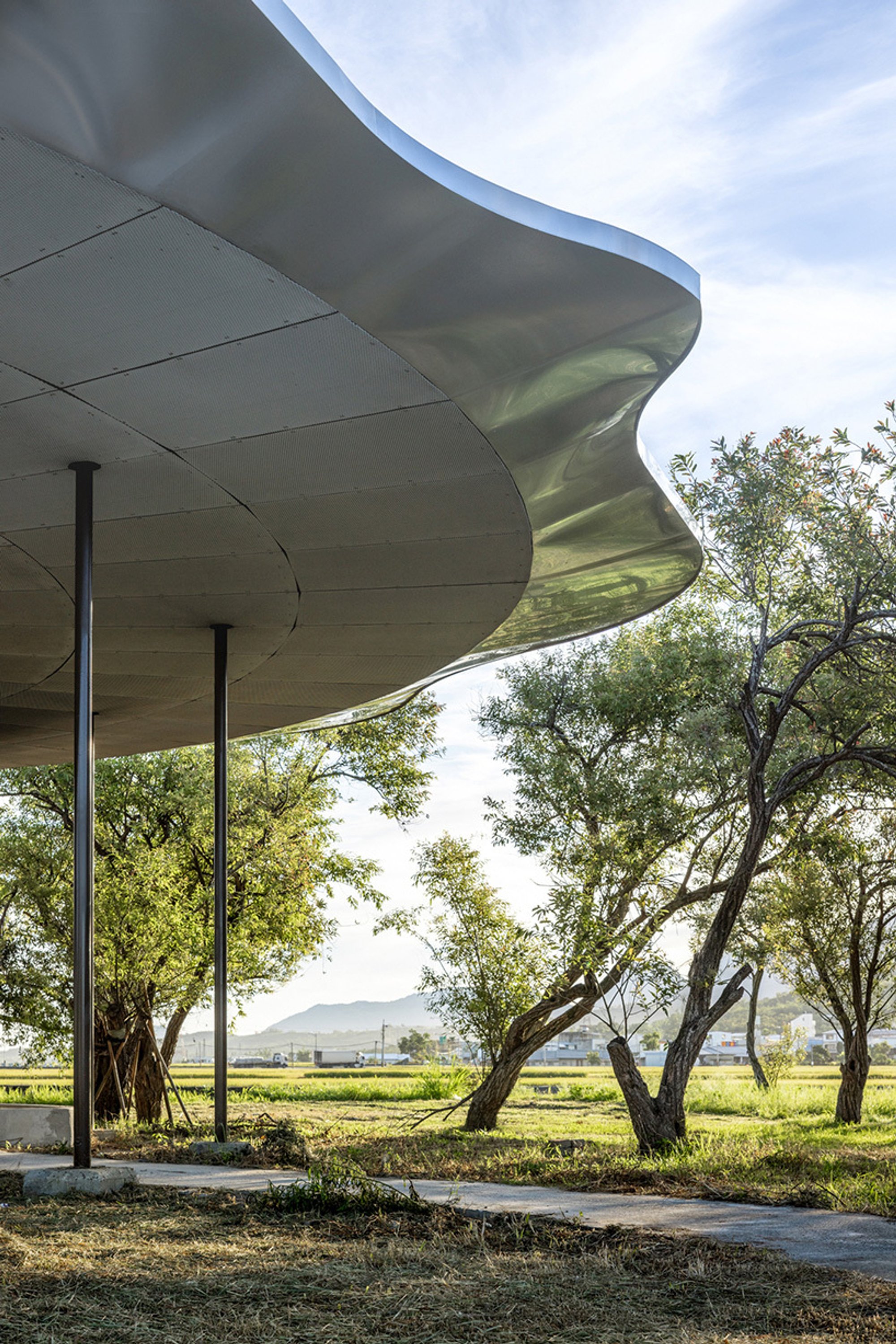 Studio APL and Likou Architecture Float a Metal Lotus Garden Over a Taitung Reservoir