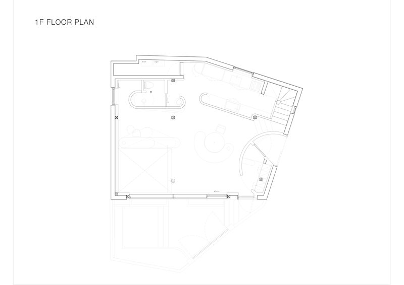 Floor plan drawing showing first level with bathroom fixtures and angled perimeter walls