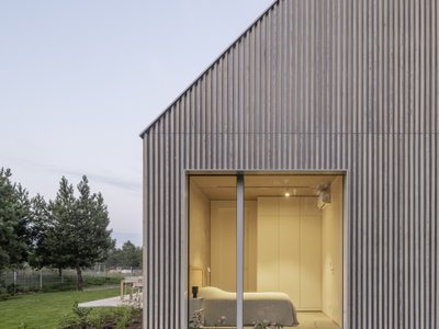 Archmondo Wraps a Masurian Lake House in Charred Larch and Standing-Seam Metal