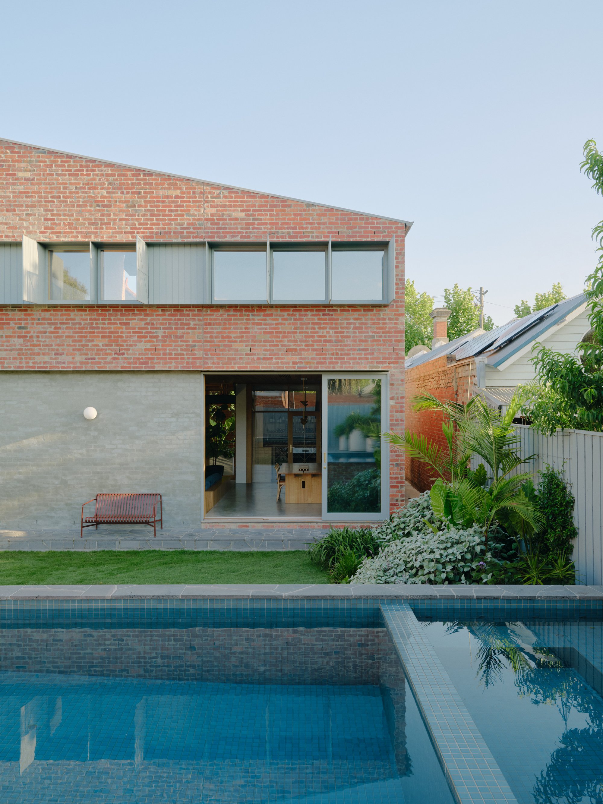 Ha Architecture Builds a Bricklayer's Son a Brick House That Outgrows Its Edwardian Shell