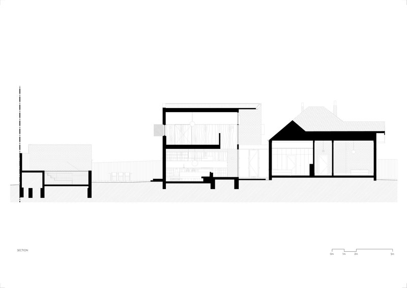 Section drawing revealing split levels, pitched roofs, and interior volumes across connected pavilions