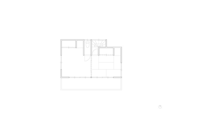 Upper level floor plan drawing depicting a compact arrangement with stairwell, bathroom, and balcony extension