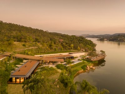 Bernardes Arquitetura Stretches a Timber Roof Along a Reservoir's Edge in Minas Gerais