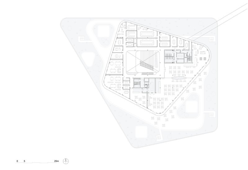 Floor plan drawing showing triangular perimeter with interior rooms and central atrium space