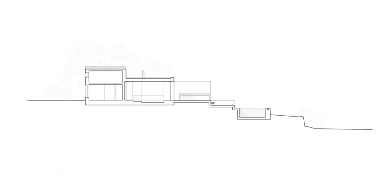 Section drawing showing stepped volumes descending along a hillside slope