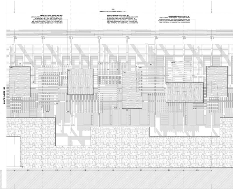 Floor plan drawing showing residential units with stone paving and decking above a structural grid