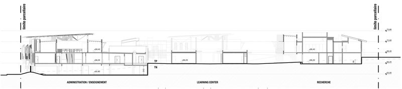 Section drawing showing the administration and enrichment wing, learning center, and residence along a sloping terrain